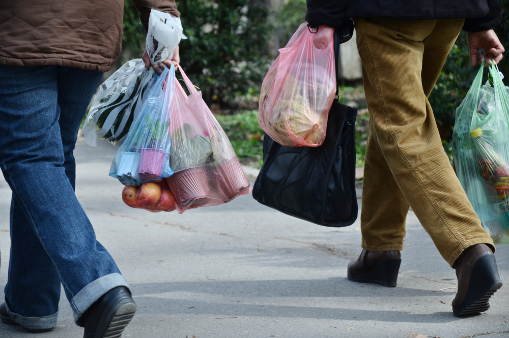 Plastic bag charge and ban UK and impacts